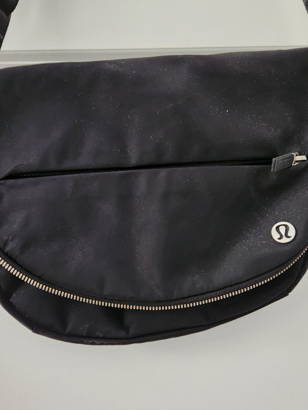 lululemon athletica Black Crescent Sling Bag with Silver Accents
